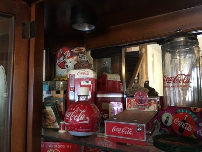 Coca cola. Caco calo. Isqueiro