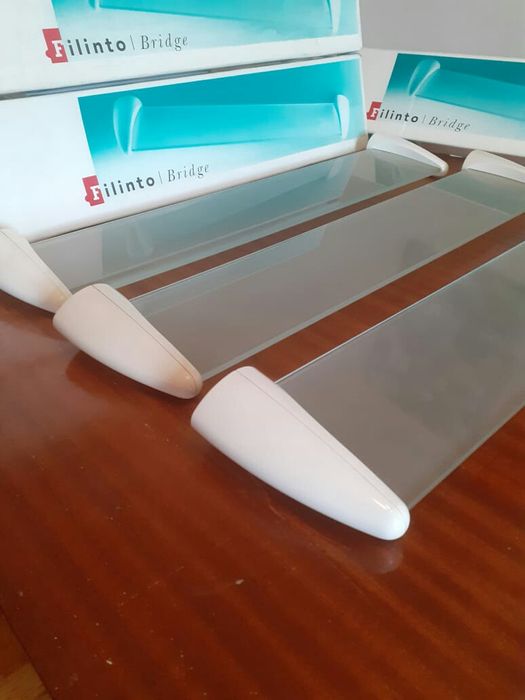 Vintage-style Space Age shelves. Made of glass and plastic. New, 65 cm