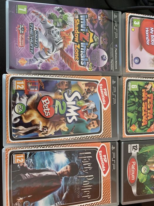 Psp em muito bom estado s/bateria + carregador + 6 jogos