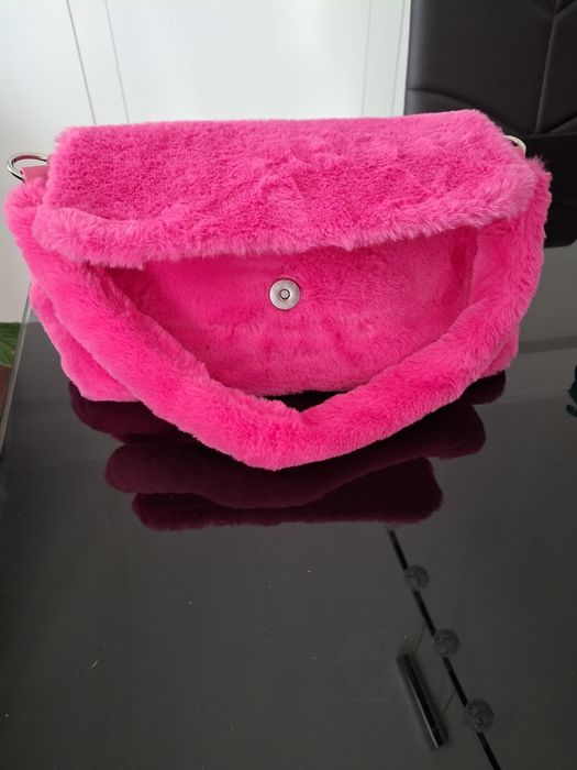 Mala e chapéu  novo