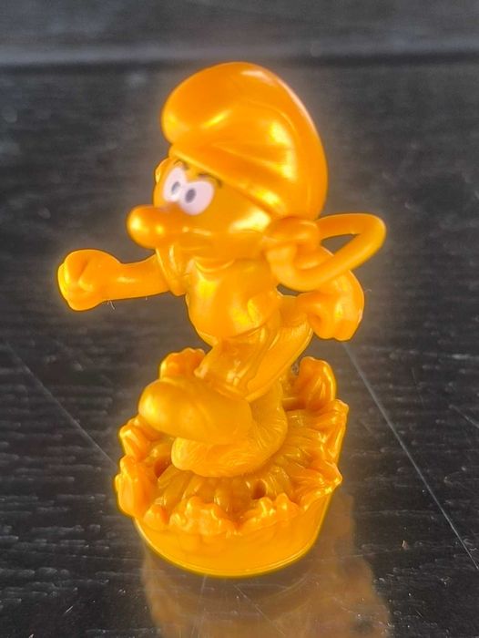 Figurka kinder złote Smerfy ZŁOTY Smerf biegacz