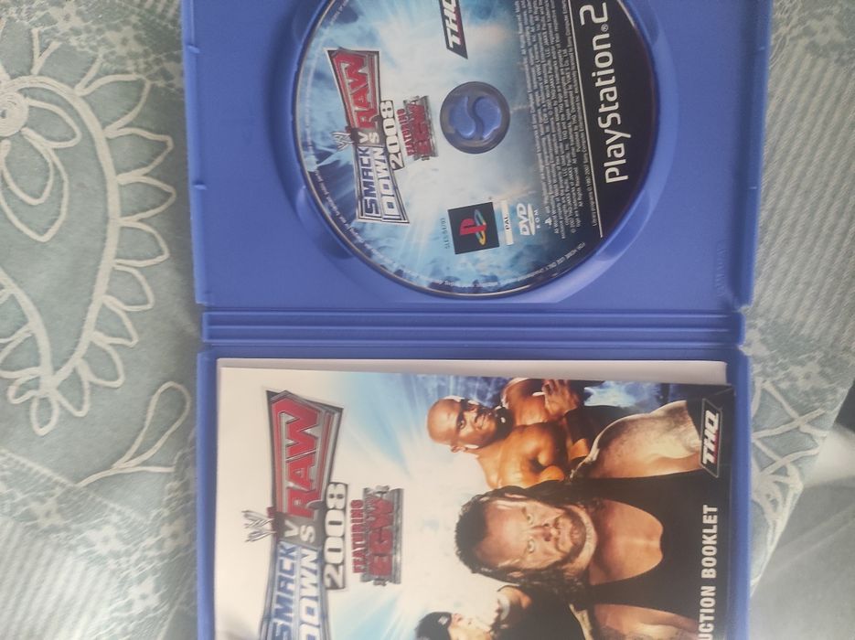 Jogo PS2 smack down vs RAW 2008
