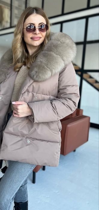 Продам пуховик женский ,натуральный мех