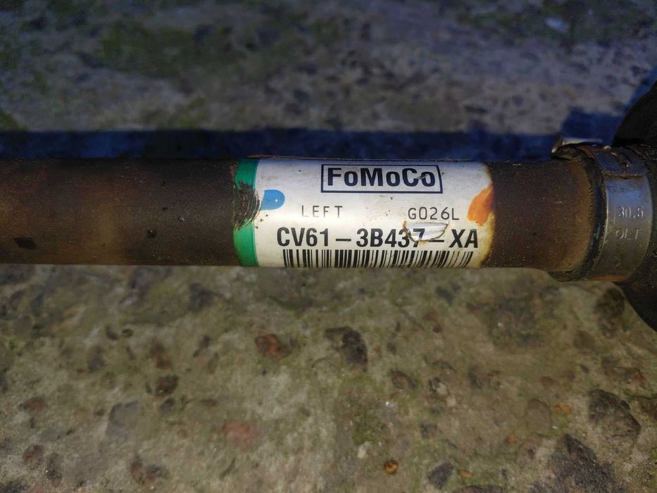 FORD FOCUS 10-18 полуось левая cv613b437xa