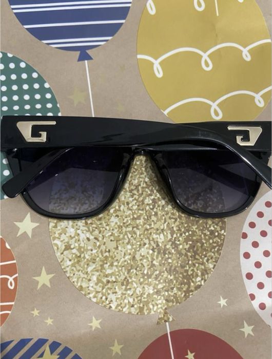 Жіночі сонцезахисні окуляри