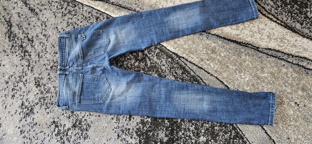 Jeansy damskie przecierane