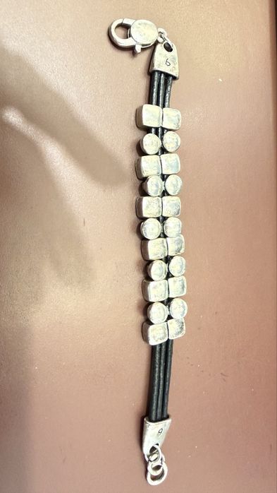 Pulseira em aco e pele preta