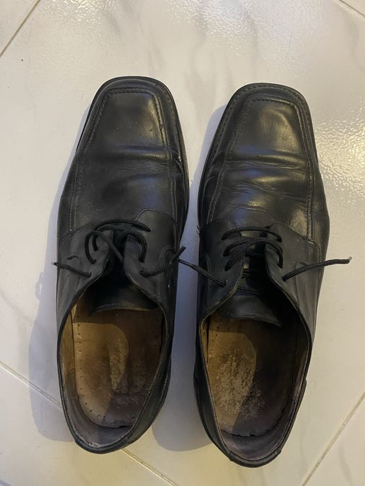 Vende-de sapatos pretos sociais de homem