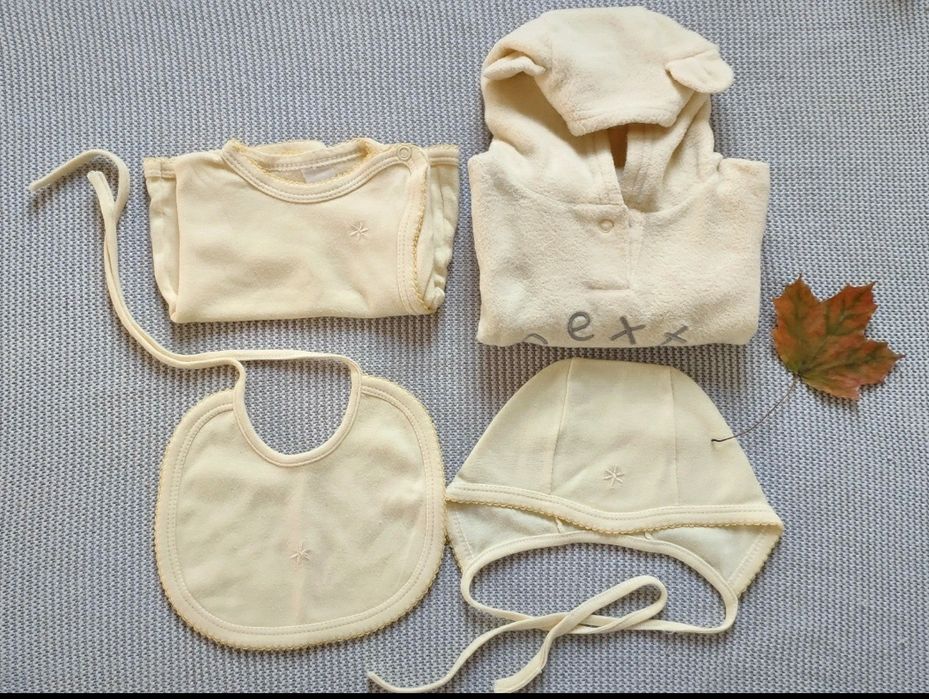 Żółta wyprawka: kaftanik, czapeczka i śliniak,