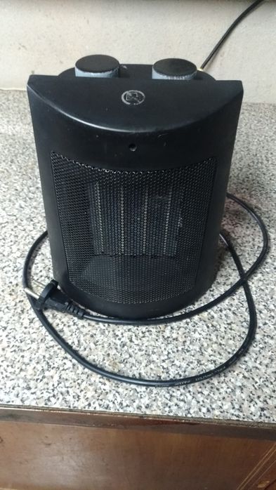 Aquecedor frio e quente de cerâmica portátil  em Preto