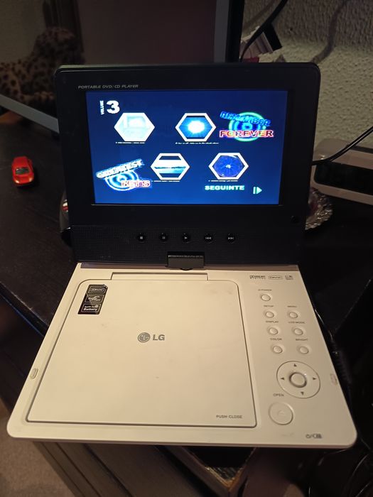 DVD portátil para venda a funcionar com os acessórios e mala LG