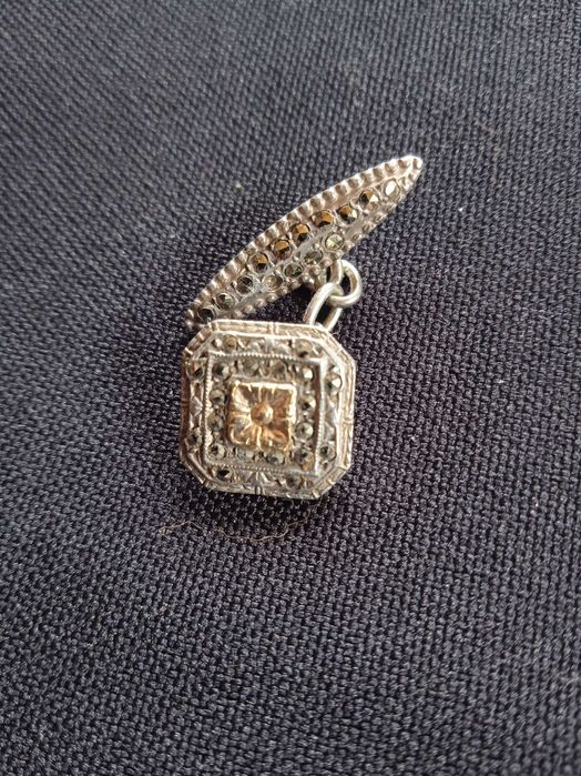 Botão de punho antigo