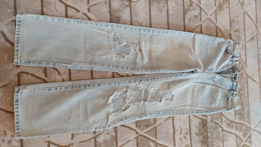 Spodnie wide leg z dziurami Sinsay