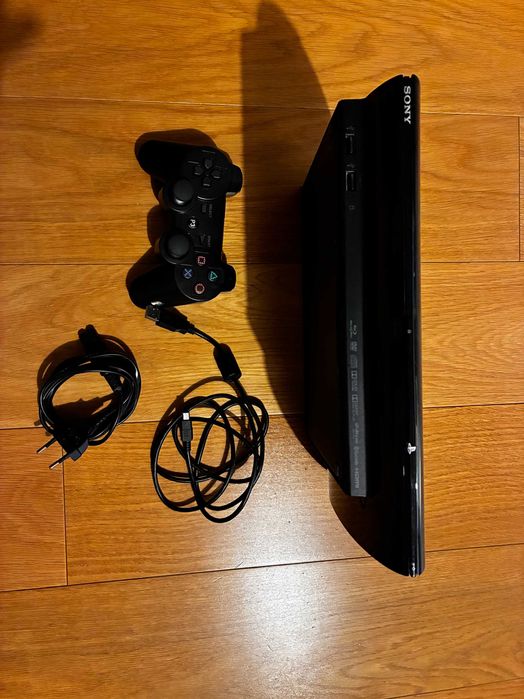 PlayStation 3 PS3 Slim + pad + kable + gry GTA V / The Last of Us