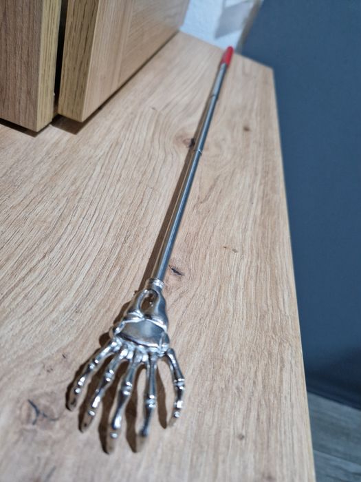 Raspador de Costas extensível.  Novo