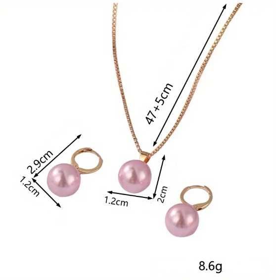 Прикраси з рожевою перлиною