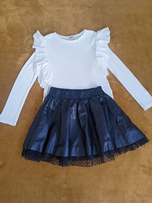 casacos, botas e roupa de criança
