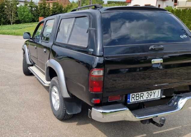 Разборка Toyota Hilux  бампер комплектний