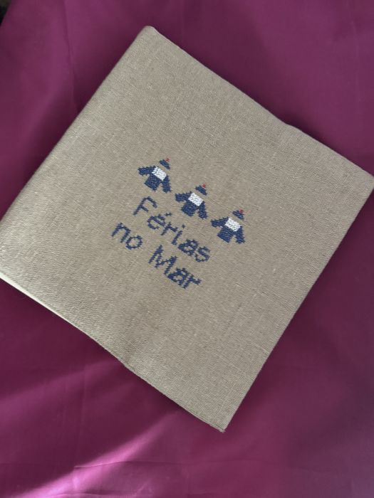 Álbum de fotografias em linho