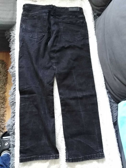 Nowe spodnie " Reserved " roz. 33/32