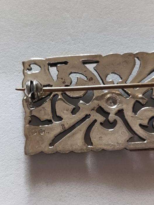 Antiga pregadeira em prata e ouro