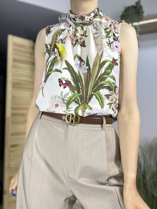 Kremowa elegancka damska bluzka w kwiatki H&M – rozmiar 38