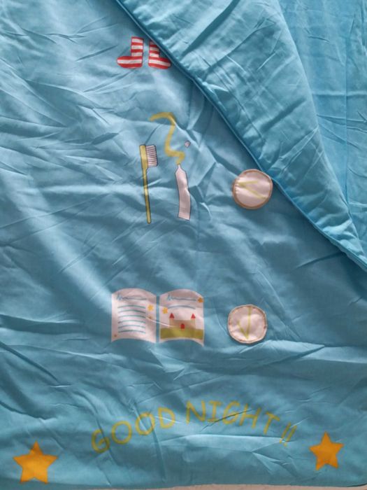 Saco cama de criança azul e verde