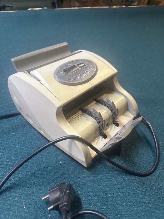 Машинка для рахування гривні