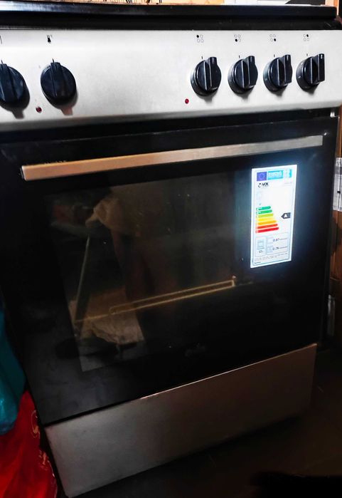 fogão elétrico , c/  forno integrado