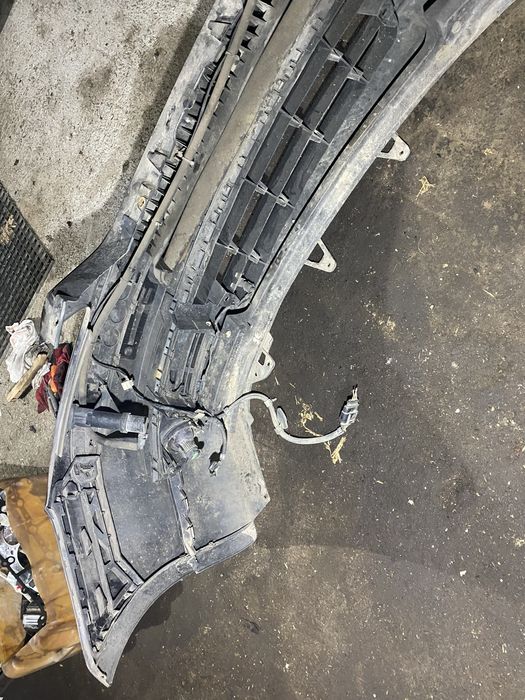 Zderzak przód halogeny spryskiwacze VW Touran 03- Caddy III