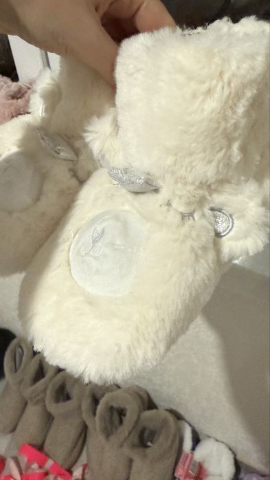 Домашні тапочки в розмірах.