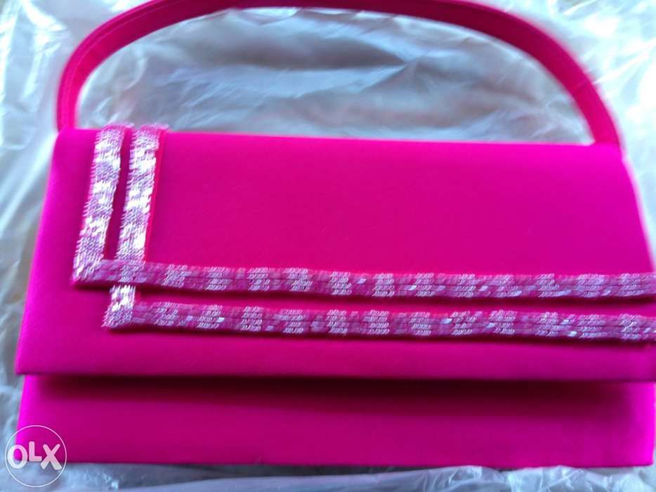 Vendo pochete de cor rosa