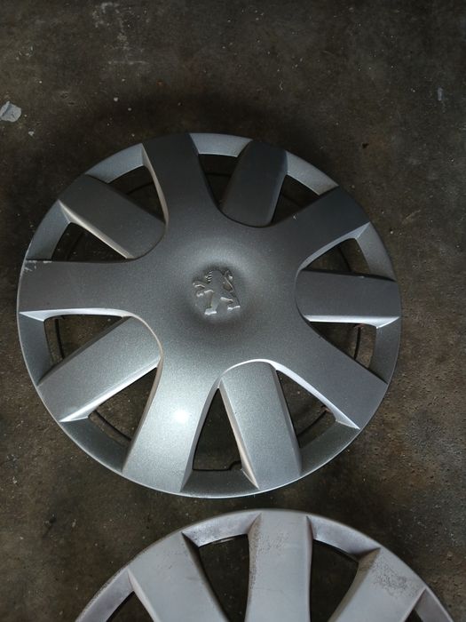 Tampões Peugeot originais roda 14 usados..