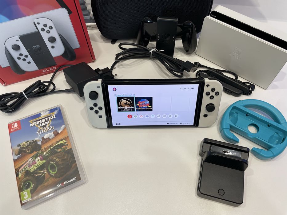 Nintendo Switch OLED б/у + гра Monster Jam + руль + док-станція