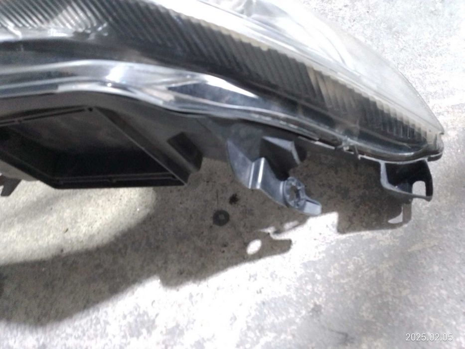 Otica farol drt e esq Renault Laguna II