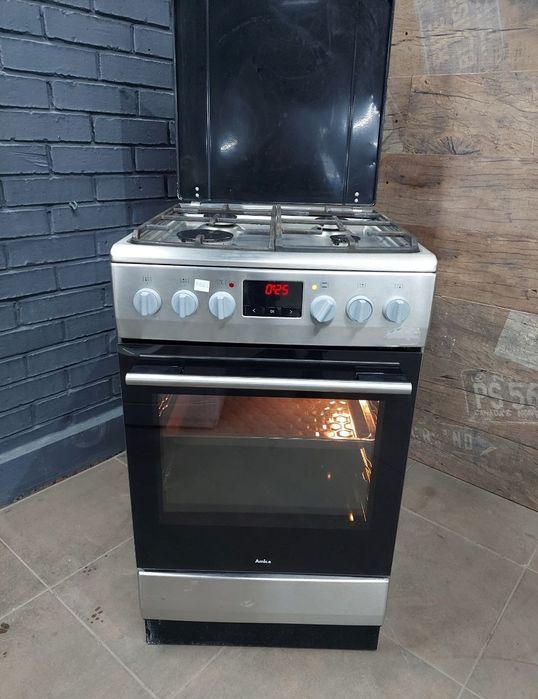 Срібна газова плита Amika vb5641c.Доставка в квартиру-будинок.