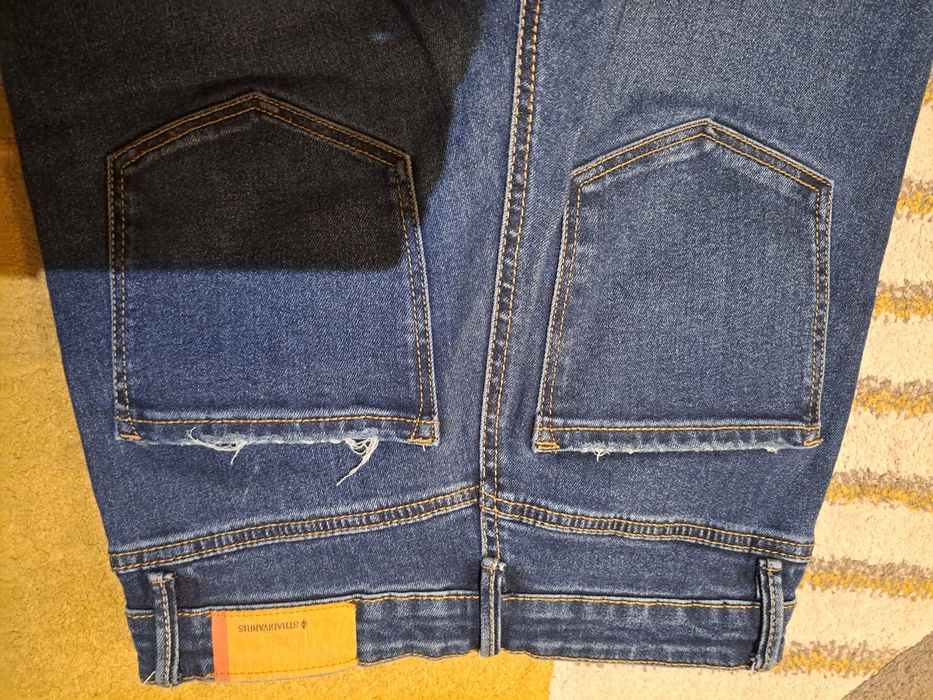 Spodnie jeansowe Stradivarius rozm.38