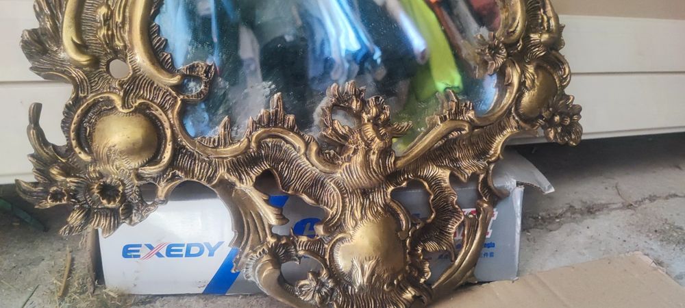 Espelho com moldura em cobre