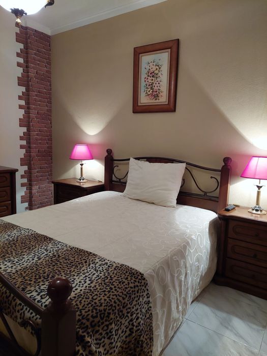 Quarto aconchegante para uma pessoa