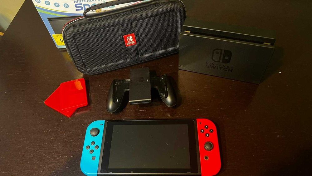 Nintendo Switch completa + todos os acessórios.