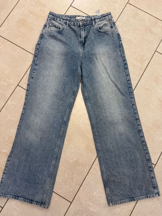 Stradivarius extra jeans spodnie dzwony szerokimi nogawkami L jak nowe