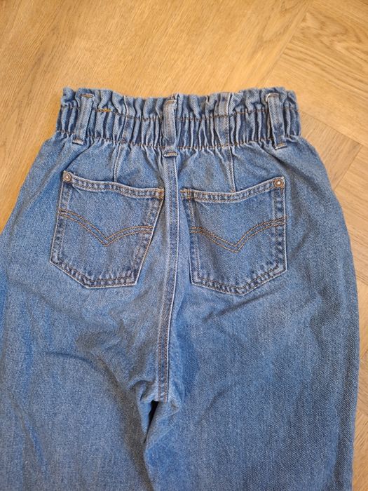 Jeansy buggy Reserved 152 cm kwiatki