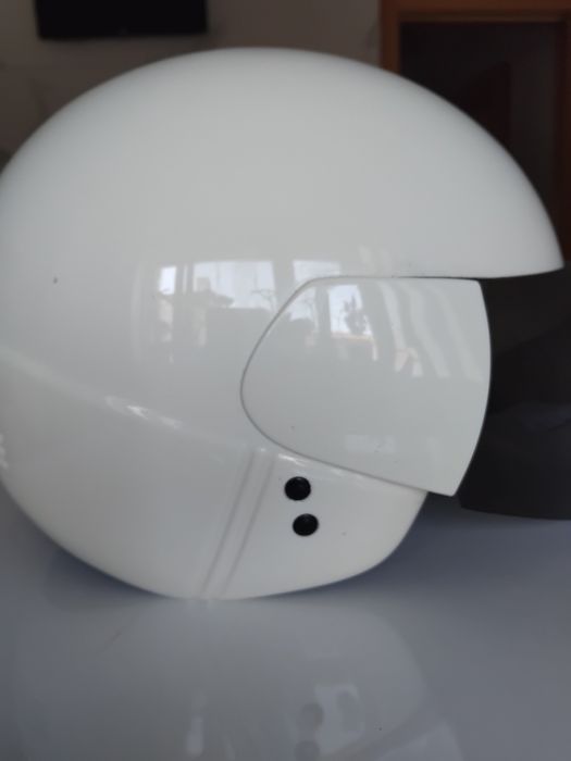 Capacete  uzado  em  muito  bom  estado  .