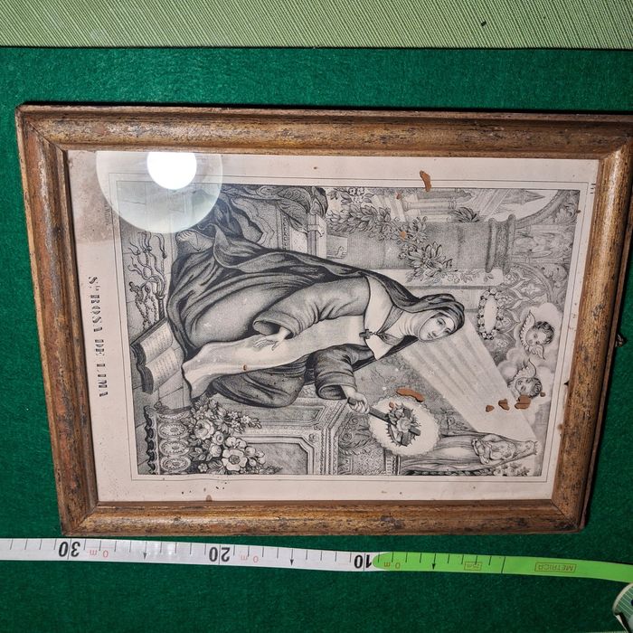 Quadro com gravura muito antigo.