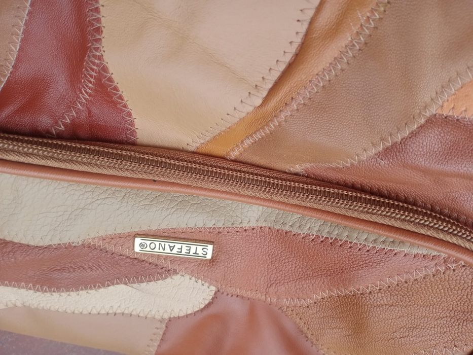 Pilnie ). Skórzana torebka Kosmetyczka