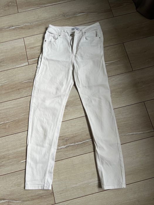 Білі джинсові штани