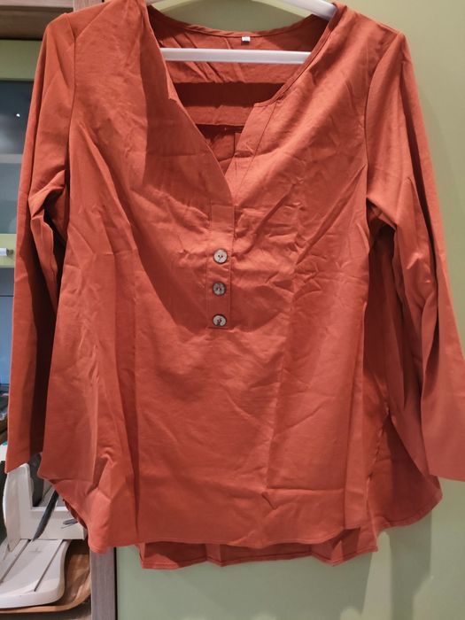 Nowa ,rdzawa  bluzka z długim rękawem