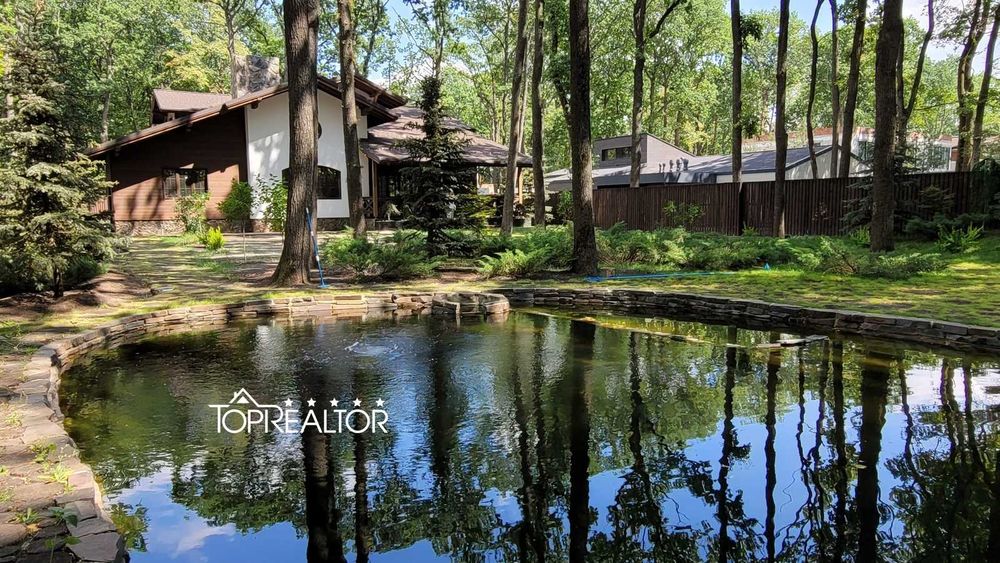 Офіс продажу селища "Форест" (Forest) пропонує дім-шале. Лісопарк