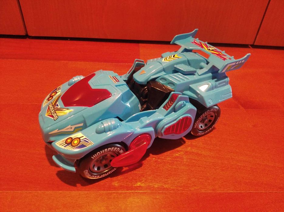 Carro dinossauro com luzes e sons