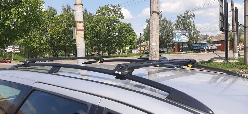 Поперечини Turtle AIR1 на високі рейлінги багажник